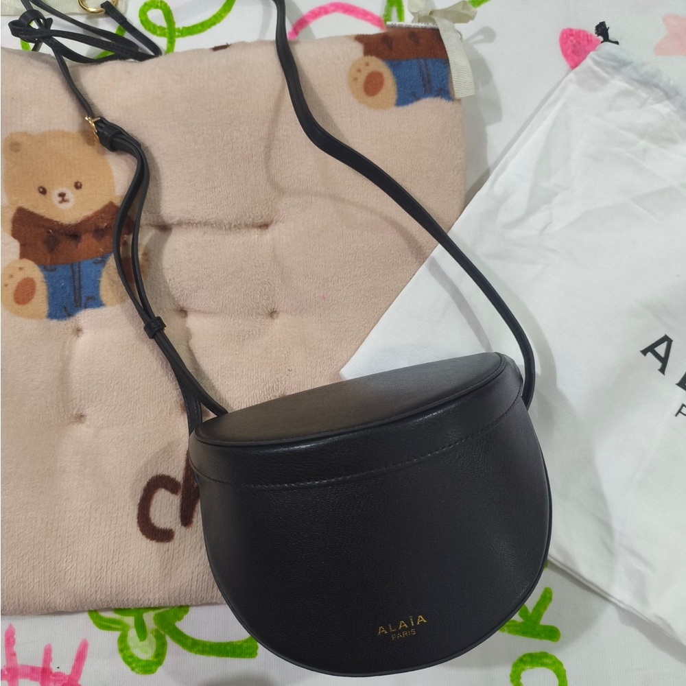Alaia Black Leather Crescent Crossbody Bag